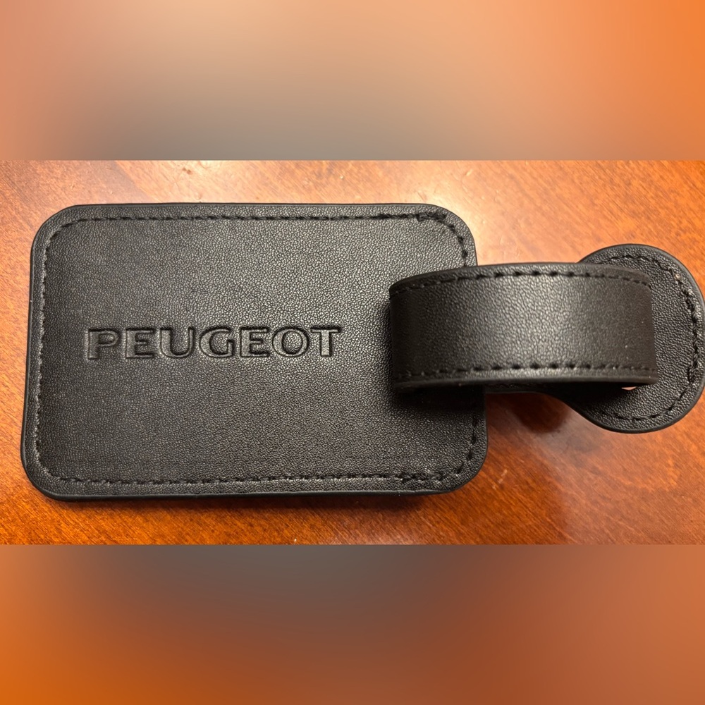 Peugeot Black Leather Tag
